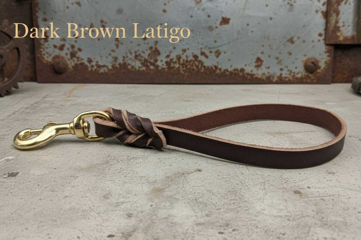 Dark brown latigo leather traffic handle for dogs with brass clip, ideal for close control during training or in crowded areas.